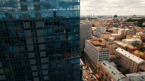 Aerial-footage-of-modern-business-center-in-the-middle-of-the-old-town