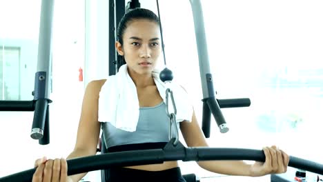 Asian-woman-Exercise-at-gym.-Sport-and-Reaction-concept.-4k-Resolution.