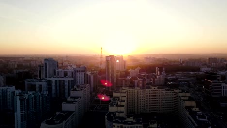 Sunset-in-megapolis.-Video.-Beautiful-cityscape-with-top-view-on-skyscrapers.-Top-view-of-the-modern-city-at-sunset