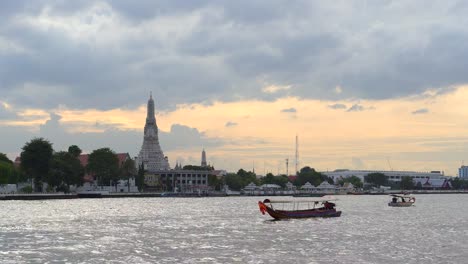 Buddhist-temple-on-the-river-at-sunset