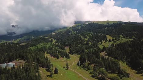 Beautiful-valley-in-Altai-mountains,-aerial-view.-Mountain-taiga,-mountains-in-the-clouds,-Altai