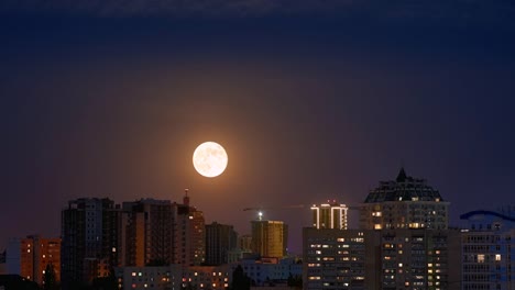 Timelapse-full-moon-rising-ower-cityscape-in-Kyiv-4K-60fps