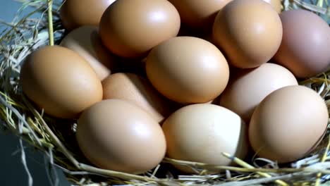 Organic-fresh-eggs-in-the-nest-ready-for-cooking.-Close-up-and-Rotating