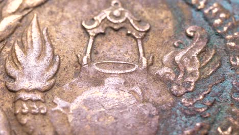 Close-up-of-very-old-coins