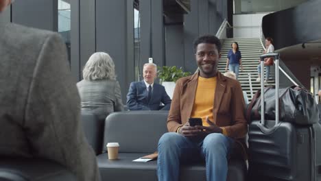 Portrait-of-Smiling-African-Man-in-Airport