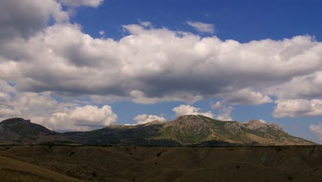 Mountainous-landscape.-Cirrus-clouds-are-running-across-the-blue-sky.