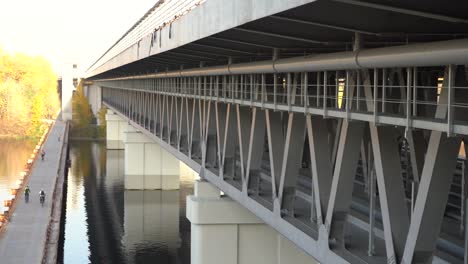 Unfinished-bridge-against-the-background-of-the-silhouette-of-the-city.-Unfinished-highway-away-city