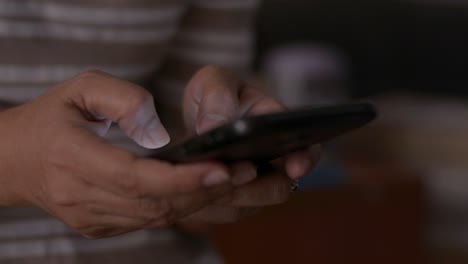 Close-up-woman-hands-texting-message-on-mobile-smart-phone-for-communication.