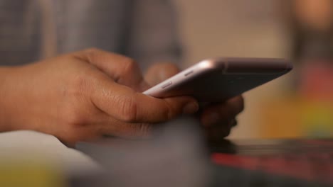 Close-up-woman-hands-texting-message-on-mobile-smart-phone-for-communication.