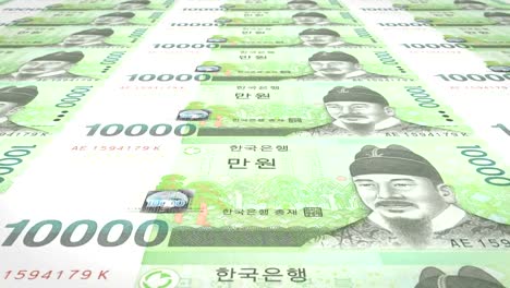 Series-of-banknotes-of-ten-thousand-wons-of-the-bank-of-the-South-Korea-rolling-on-screen,-coins-of-the-world,-cash-money,-loop