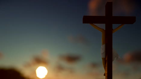 Christians-praying-at-Jesus-cross,-blurry-sunrise