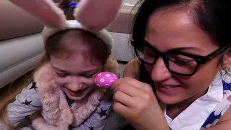 Happy-mother-and-daughter-preparing-for-Easter