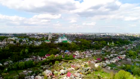 Aerial-view-at-the-town-from-the-top-of-the-highest-buildings-in-Chernigov---Troitsko-Ilyinsky-Monastery-bell-tower.