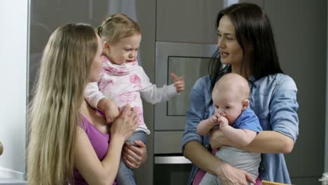 Mothers-with-Children-Chatting-at-Home