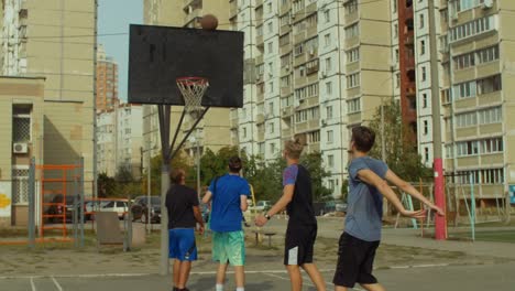 Basketball-player-shooting-for-field-goal-on-court