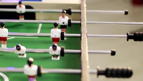 4K-People-playing-table-football.