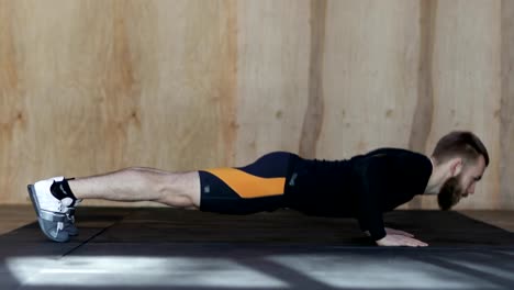 Young-Man-Doing-Push-Ups-Exercise-During-Workout-Training-At-Gym