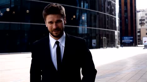 Epic-shot-of-smiling-businessman-outdoor-near-business-centre