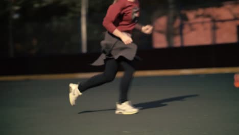 Woman-team-plays-football-in-evening.-Football-training-woman-team