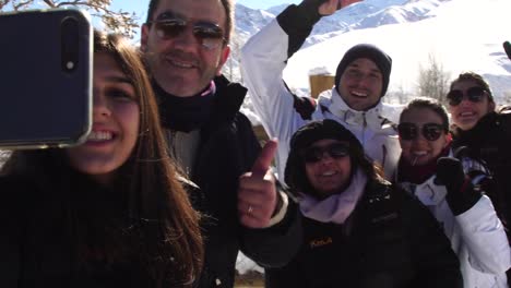 Family-taking-a-selfie-in-Snow