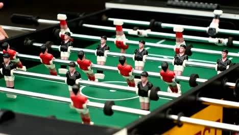 Guys-playing-table-football-50-fps