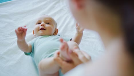 Mother-Playing-with-Young-Baby