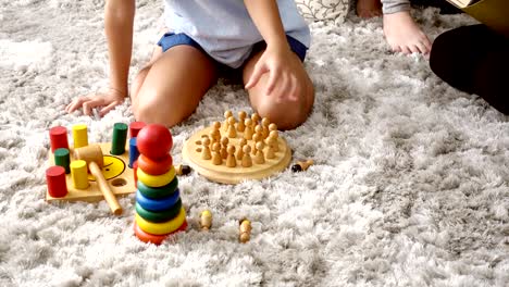 Young-girl-playing-game-in-living-room