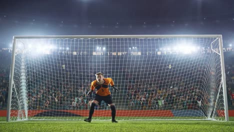 Fußball-Torwart-springt-und-spart-Kugel