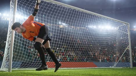 Soccer-goalkeeper-jumps-and-catches-ball