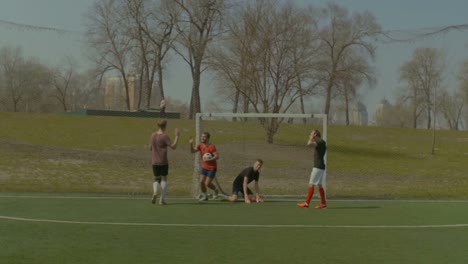 Striker-celebrating-a-goal-during-football-match