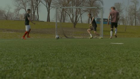 Football-team-scoring-a-goal-during-training-match