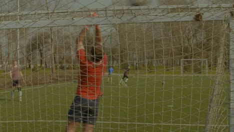 Soccer-ball-blazing-out-the-crossbar-after-kick