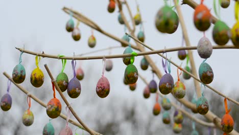 Easter-eggs-on-a-tree-swaying-in-the-wind