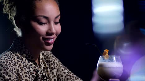 Portrait-of-single-charming-woman-drinking-at-bar