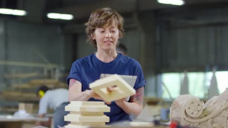 Woman-Using-Tablet-in-Joinery