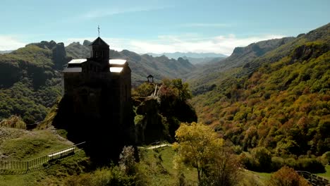 4K-UHD-Aerial-view-of-a-mountain-monastery-standing-on-a-cliff