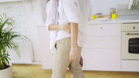 Girlfriends-dancing-on-kitchen