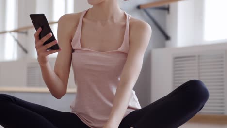 Young-Ballerina-Using-Phone