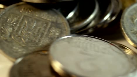 Rotated-coins-on-white-background