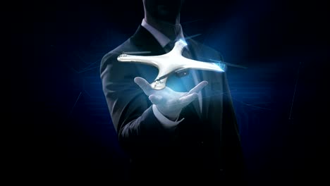 Businessman-opens-palm,-Rotating-Drone,-Quadrocopter,-with-futuristic-user-interface,-Virtual-graphic.-blue-x-ray-image.-4k-movie.