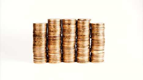 Stop-motion-rising-stack-of-gold-coins,-rising-investment-and-increasing-profits-on-a-white-isolated-background