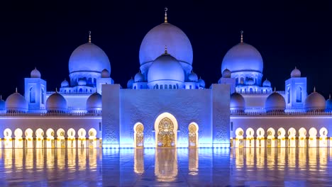 Sheikh-Zayed-Grand-Moschee-beleuchtet-bei-Nacht-Zeitraffer,-Abu-Dhabi,-Vereinigte-Arabische-Emirate