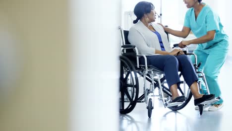 African-American-positive-female-nurse-and-disabled-patient