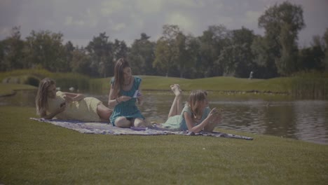 Attractive-women-relaxing-in-nature-in-summer