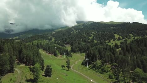 Beautiful-valley-in-Altai-mountains,-aerial-view.-Mountain-taiga,-mountains-in-the-clouds,-Altai