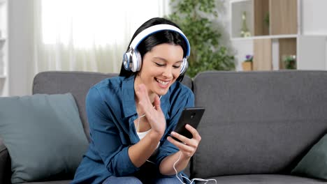 Woman-having-a-video-call-on-phone-at-home