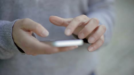 Closeup-shot-of-female-hands-using-smartphone.