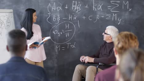 Student-Trying-to-Explain-Equations-on-Blackboard