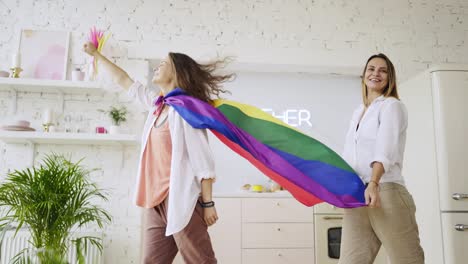 Girlfriends-have-fun-with-rainbow-flag