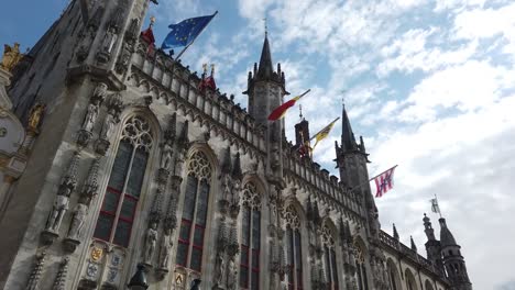 View-of-the-Gruuthuse-Palace.-The-area-is-farther-by-the-palace.-Tourists-walk.